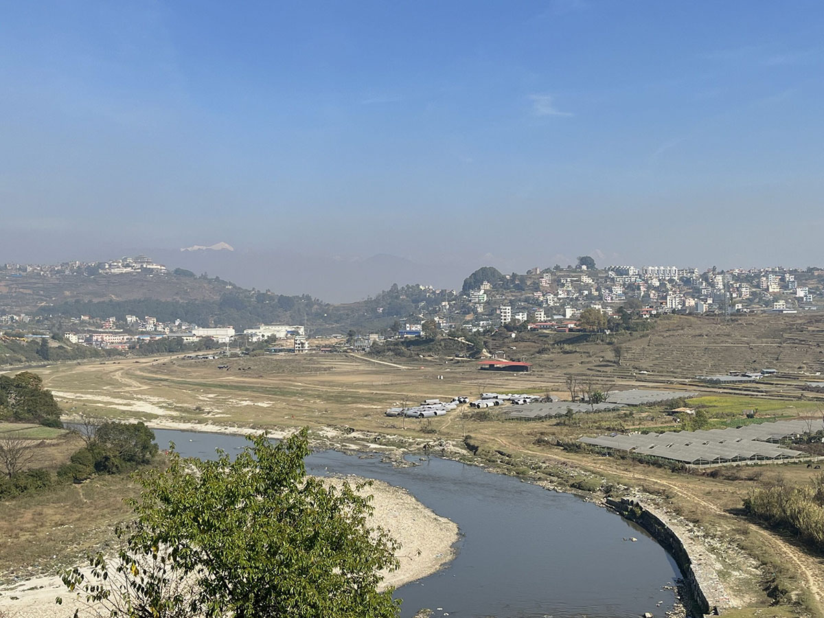 5-the-flat-land-across-the-bagmati-river-bulldozed-to-make-way-for-the-fast-track-with-the-army-camp-at-a-distance-photo-bibek-bhandari-jpg-min-1-scaled